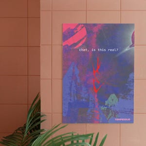 May include: Abstract art print with a blend of pink, purple, and blue hues. The artwork features the text "chat, is this real?" in white, with red accents and the word "TEMPESQUE" at the bottom. The print is displayed on a wall.