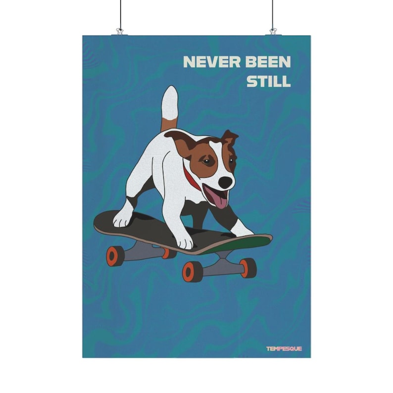 May include: Poster featuring a cartoon dog on a skateboard, with the words "NEVER BEEN STILL" in white text. The dog is white and brown with a red collar. The skateboard has orange wheels and a green deck. The background is blue.