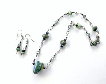 Green Heart Necklace and earrings, Sterling Silver and Lamp worked glass heart and beads, green, teal, and gold swirls