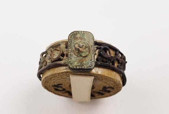 Ancient Celtic ring with openwork filigree and an eye decoration; from a European collection