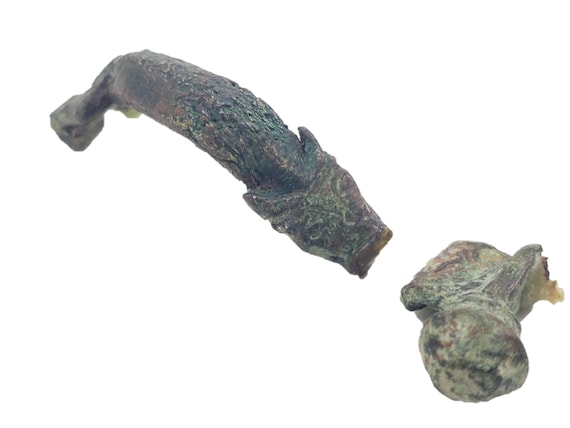 Draco (dragon)? Anthropomorphic Roman brooch from a collection from the Celtiberian region