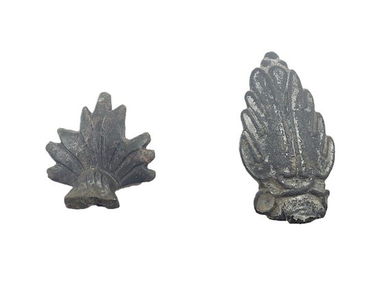 Ancient Celtiberian (Celtic) or Roman bronze leaves (one is a brooch), likely from the Iberian Peninsula; from an old collection