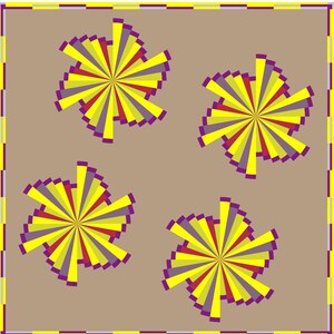 May include: A square textile featuring a light brown background with a border of alternating yellow and purple segments. Four circular, star-like motifs are arranged in a grid, each composed of radiating yellow, purple, and red triangular rays.