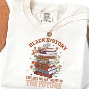 Black History Book Lovers Shirt lovers, this Comfort Colors tee is made for turning pages and honoring legacies, all in one easy, everyday look. This shirt  is not just a garment; it's a celebration of past triumphs and future aspirations.