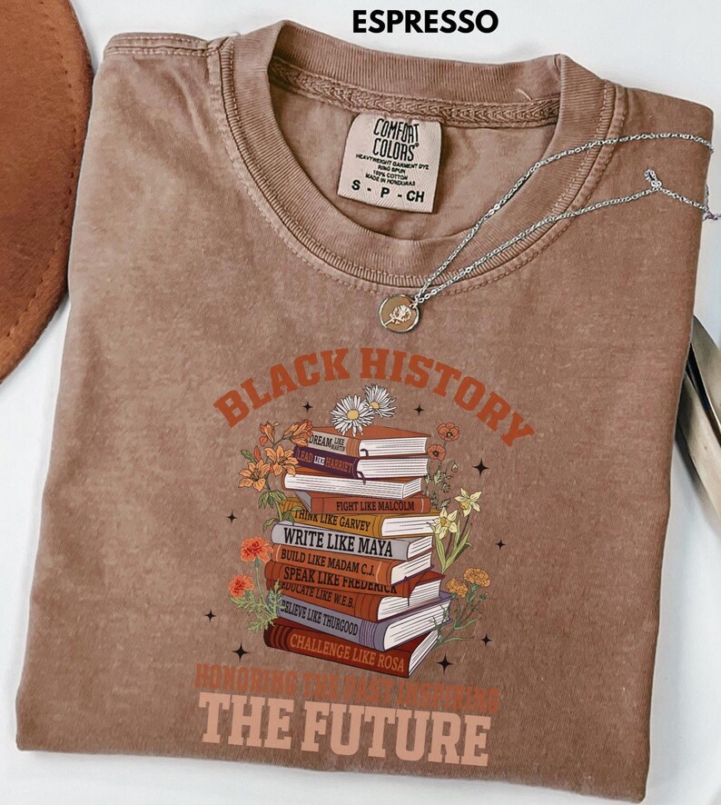 Black History Book Lovers Shirt lovers, this Comfort Colors tee is made for turning pages and honoring legacies, all in one easy, everyday look. This shirt  is not just a garment; it's a celebration of past triumphs and future aspirations.