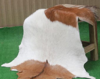 Brown & White Goat Skin Rug: Natural Animal Hide (38x25 inches)