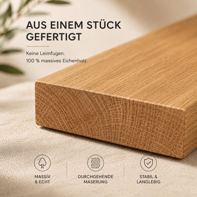 May include: A rectangular piece of solid oak wood with a visible grain pattern. The text reads: AUS EINEM ST&Uuml;CK GEFERTIGT, Keine Leimfugen, 100 % massives Eichenholz, MASSIV & ECHT, DURCHGEHENDE MASERUNG, STABIL & LANGLEBIG with three circular icons.