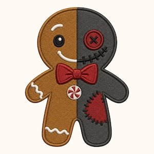 May include: An embroidered patch shaped like a gingerbread person, split vertically between brown and black. The brown side features a white icing smile and wavy lines. The black side has a red button eye, stitched mouth, and a red patch with black stitching. A red bow tie and a peppermint candy are centered.
