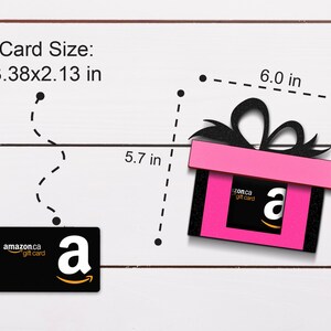 May include: A pink gift box with a black bow and a black and white Amazon gift card inside. The gift box is 6 inches wide and 5.7 inches tall. The gift card is 3.38 inches wide and 2.13 inches tall.