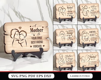 May include: A set of ten laser cut wooden signs with various mother and child designs and quotes. The signs feature a mother and child hugging, with text such as "A Mother Is Your First Best Friend Forever" and "A Mother's Hug Last Long After Let's Go".