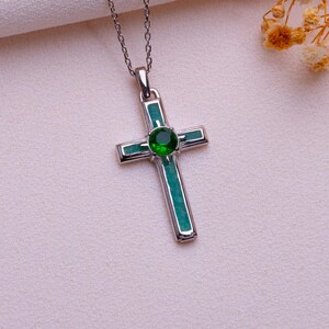 Handmade Natural Stone Cross Necklace with Birthstone, crafted from 925 sterling silver. Sideways cross symbolizes faith and protection, with natural stone resin for healing and personal energy. Available in 14K gold, silver, rose gold, or black plating. Adjustable cable chain (14–22 inch) with lobster clasp. Hypoallergenic and nickel-free. Perfect for baptisms, birthdays, or meaningful spiritual gifts. Gift-ready packaging included.