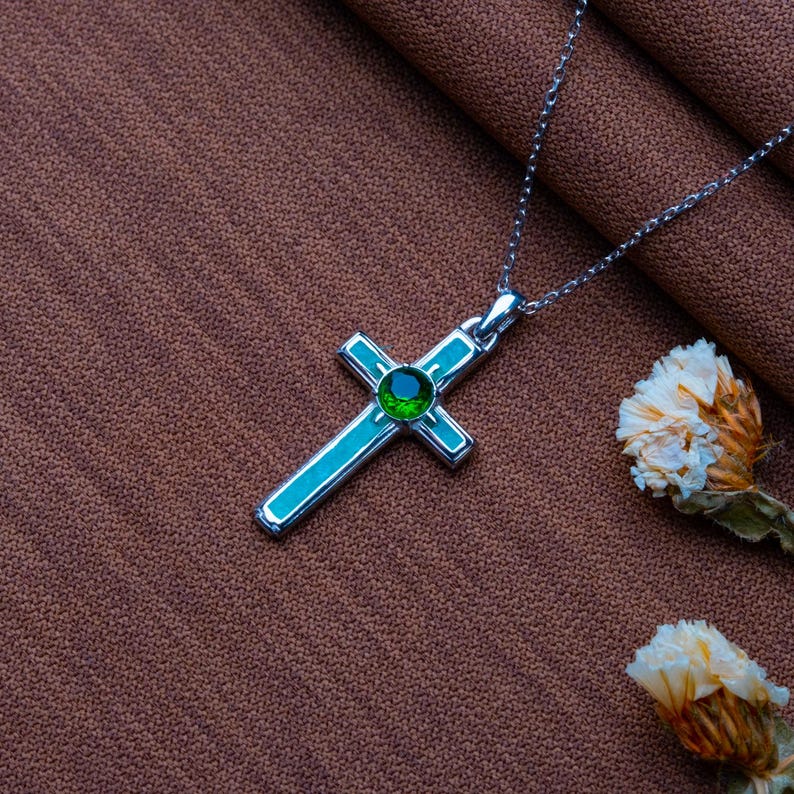 Handmade Natural Stone Cross Necklace with Birthstone, crafted from 925 sterling silver. Sideways cross symbolizes faith and protection, with natural stone resin for healing and personal energy. Available in 14K gold, silver, rose gold, or black plating. Adjustable cable chain (14–22 inch) with lobster clasp. Hypoallergenic and nickel-free. Perfect for baptisms, birthdays, or meaningful spiritual gifts. Gift-ready packaging included.