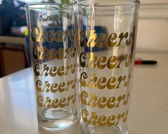 Juego de vasos vintage de los 70, dorados, estilo Collins Highball, con la inscripción "Cheers".
