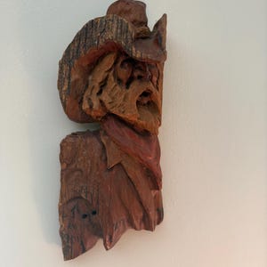 Hand carved wooden Cowboy