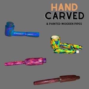 May include: Four hand-carved wooden pipes with colorful paint designs.  The pipes are in various shapes and sizes.  HAND CARVED & PAINTED WOODEN PIPES is written in the top right corner of the image.