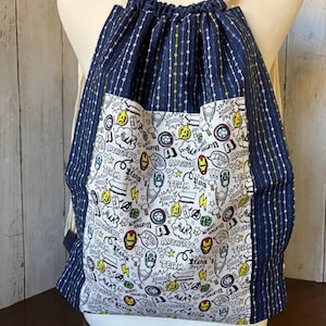 Drawstring Backpack - Blue striped fabric with cartoon character fabric pocket