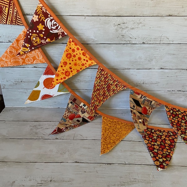 Fall Blast Bunting. Add a blast of fall color to your decor. Makes a great wall hanging or mantle scarf.