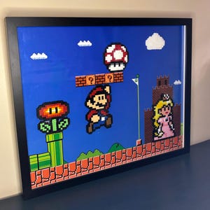 Super Mario Pixel Wall Art - Retro Gaming Room Decor - Handmade Perler Beads Frame - Geeky Gamer Gift - Nerdy Home Decor