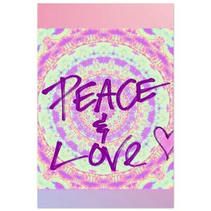 May include: A rectangular wall art print featuring a vibrant tie-dye mandala pattern in shades of lime green, yellow, and purple. The text PEACE & LOVE is written in a bold, dark purple script across the center, accompanied by a small heart symbol.