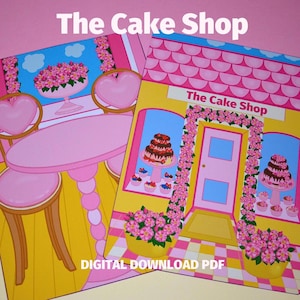 Puede incluir: Un PDF descargable digital imprimible de un juego de tienda de pasteles rosa y amarillo. El juego incluye una mesa y sillas, una fachada de tienda con una puerta y pasteles en el escaparate. El texto "The Cake Shop" está en la fachada de la tienda.