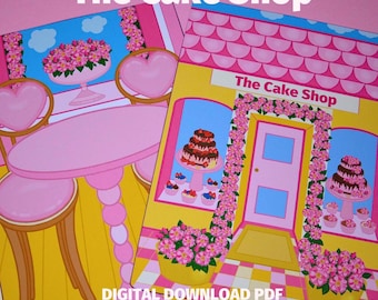 Op de afbeelding: Een printbare digitale download-PDF van een roze en gele speelset voor een cake shop. De set bevat een tafel en stoelen, een winkelgevel met een deur en taarten in de etalage. De tekst "The Cake Shop" staat op de winkelgevel.