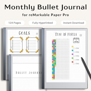 May include: Digital monthly bullet journal for reMarkable Paper Pro. The journal features pages for goals and a year in pixels, with a black stylus. The journal is fully hyperlinked and has 124 pages.