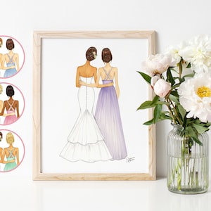 May include: A watercolor illustration of two women in wedding attire, standing back to back. The woman on the left is wearing a white wedding dress with a long train. The woman on the right is wearing a lavender bridesmaid dress. The illustration is framed in a light wood frame.