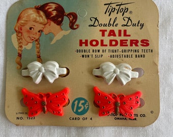 Vintage 1950’s set of Tail Holders on card