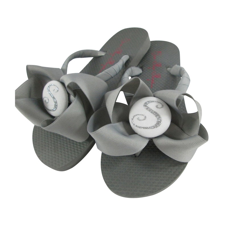 silver bow flip flops