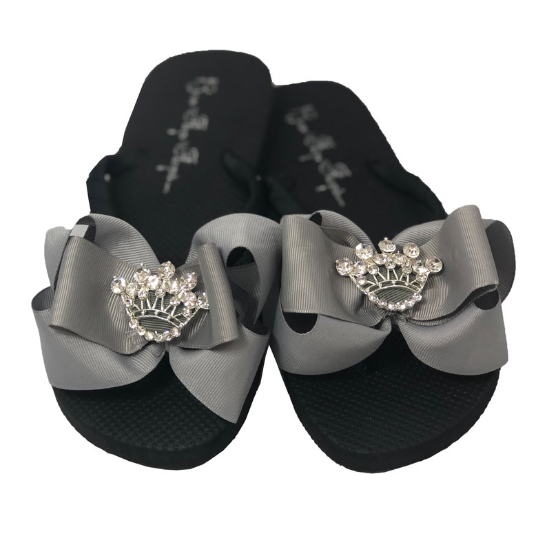 Ladies and Child Sizes Prom Black Rhinestone on Flat or Wedge Heel Fleur de Lis Bow Flip Flops Gymnastics Bridesmaids Pageant Sandals