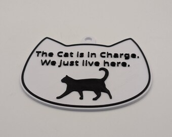 3D Printed Cat Lover Gift – "The Cat Is in Charge" Funny Sign – Pet Door or Crate Tag – 3D Printed Home Decor – Quirky Gift for Cat Owners