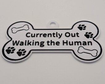 3D Printed Dog Lover Gift – Funny Bone Sign "Currently Out Walking the Human" – 130mm x 80mm – Pet Tag for Crate, Door, or Kennel