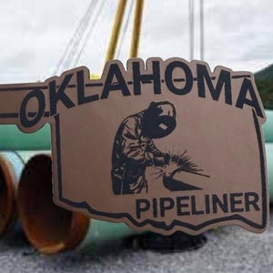 Oklahoma Pipeliner welder with pancake hood leatherette patch. Backed with thermal bonding.