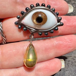 Handmade flamework golden glass eye brooch with golden tears
