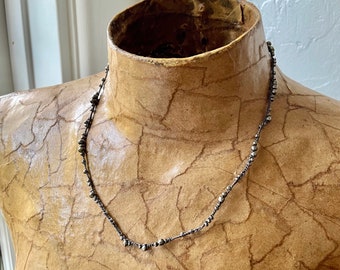 chrochet silk chain with metallic black seeds beads and silver clasp