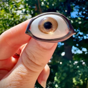 Handmade flamework glass eye brooch
