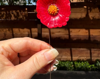 Red flameworked glass flower