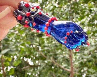 cobalt blue and coral glass mano figa charm