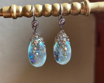 Sparkly barnacle capped flameworked pale Aqua drop earrings