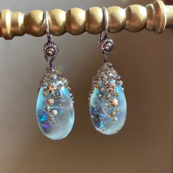 Sparkly barnacle capped flameworked pale Aqua drop earrings