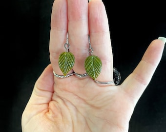 green glass lampwork leaf earrings