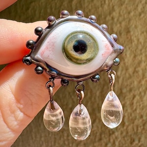 Handmade flamework glass eye brooch with 3 tears