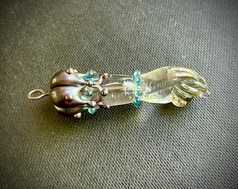 Clear glass figa hand charm with sparkly aqua glass “jewels”