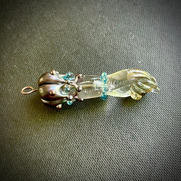 Clear glass figa hand charm with sparkly aqua glass “jewels”