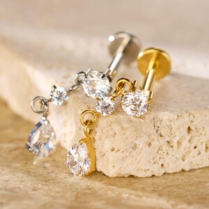 Clous d'oreille pendants en titane • Boucle d'oreille à l'arrière plat • Clous tragus • Clous hélicoïdal • Clous pour cartilage • Clous pour le nez • 18G/16G Filetage interne
