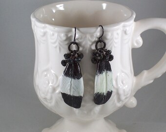 Artisan Ceramic Earring: Black and White Feather earrings by ceeceedesigns on Esty