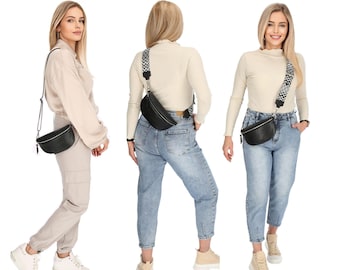 May include: Three women wearing different outfits and carrying black fanny packs with patterned straps. The fanny packs are worn across the body.