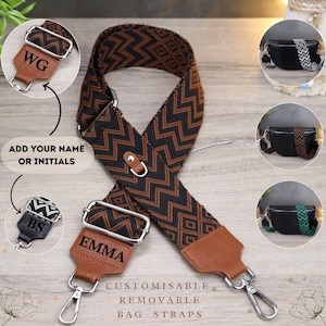 May include: Customizable black and brown woven bag straps with a brown leather accent and silver hardware. The straps have a zig-zag pattern and can be personalized with a name or initials. "Add your name or initials" and "Customisable Removable Bag Straps" are written on the image.