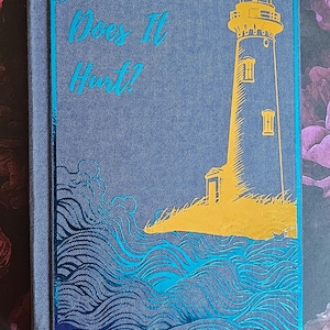 Does It Hurt by HD Carlton rebound hardcover - Handmade custom special edition book rebind with satin bookmark and aqua sprayed edges.