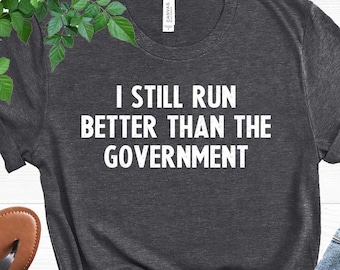 Funny Broken Leg Shirt, I Still Run Better Than The Government  Shirt, Leg Surgery Tee, Leg Amputee Gift, Wheelchair T-shirt, Political Gift